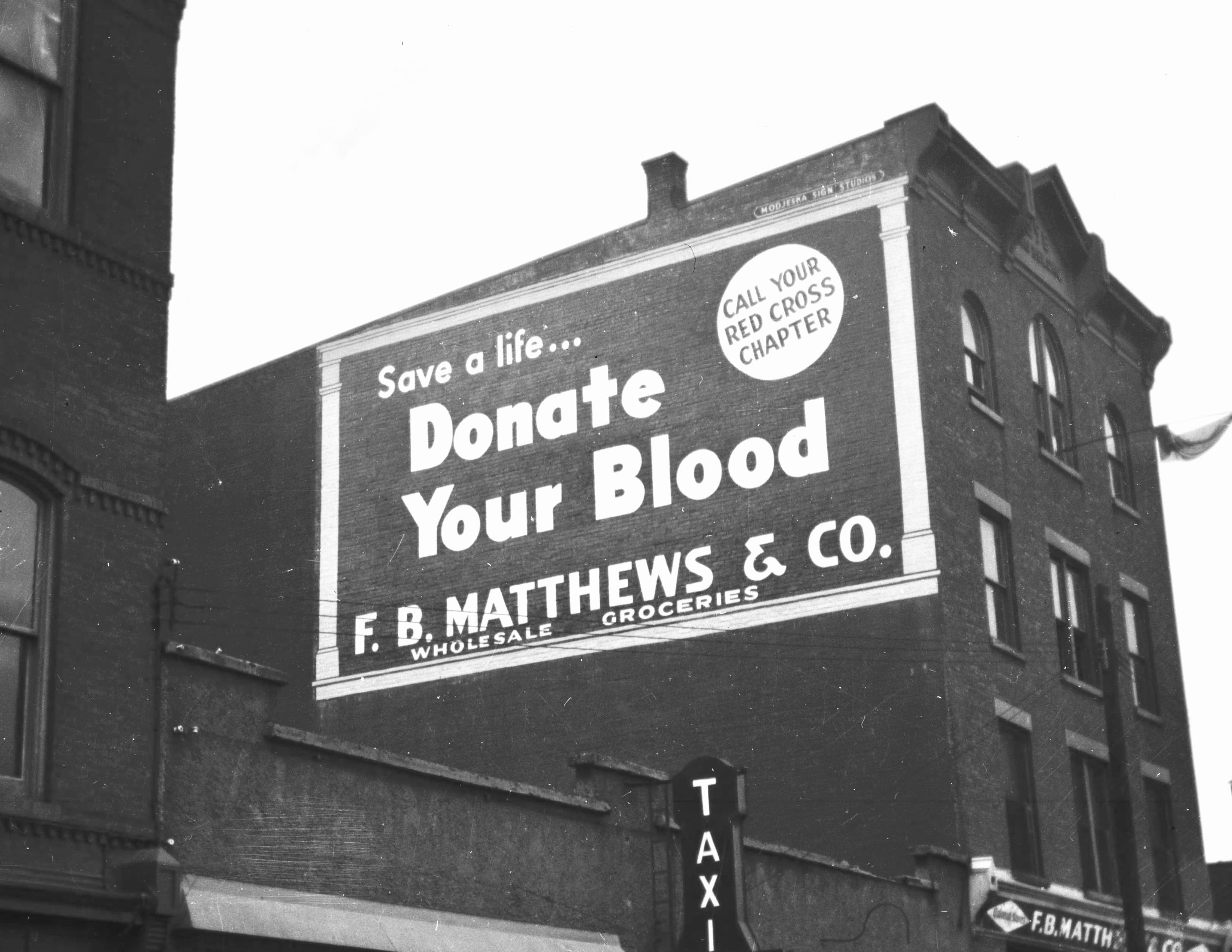 Donate Your Blood wall sign, F.B. Matthews & Co.