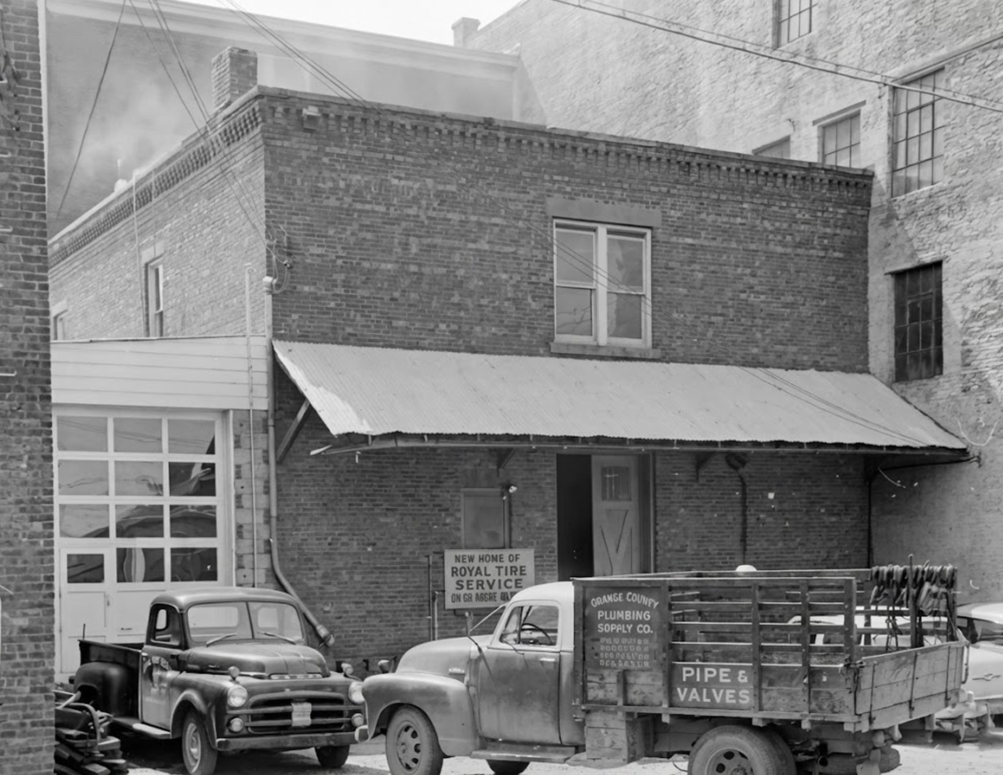 New Home of Royal Tire Service, mid-century